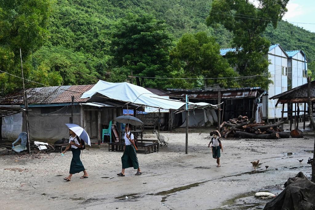 Students walking in Kyauktalone camp in Kyaukphyu, Rakhine state, where Muslim residents have been forced to live for seven years. (Ye Aung Thu / AFP)