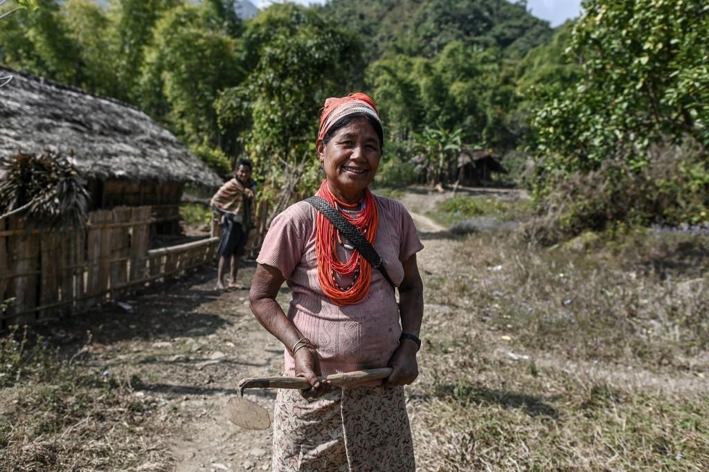 haman Jang Ngon prepares to go to farming in Satpalaw Shaung village in Lahe township, Sagaing Division, northwest of Myanmar. (Ye Aung Thu / AFP)