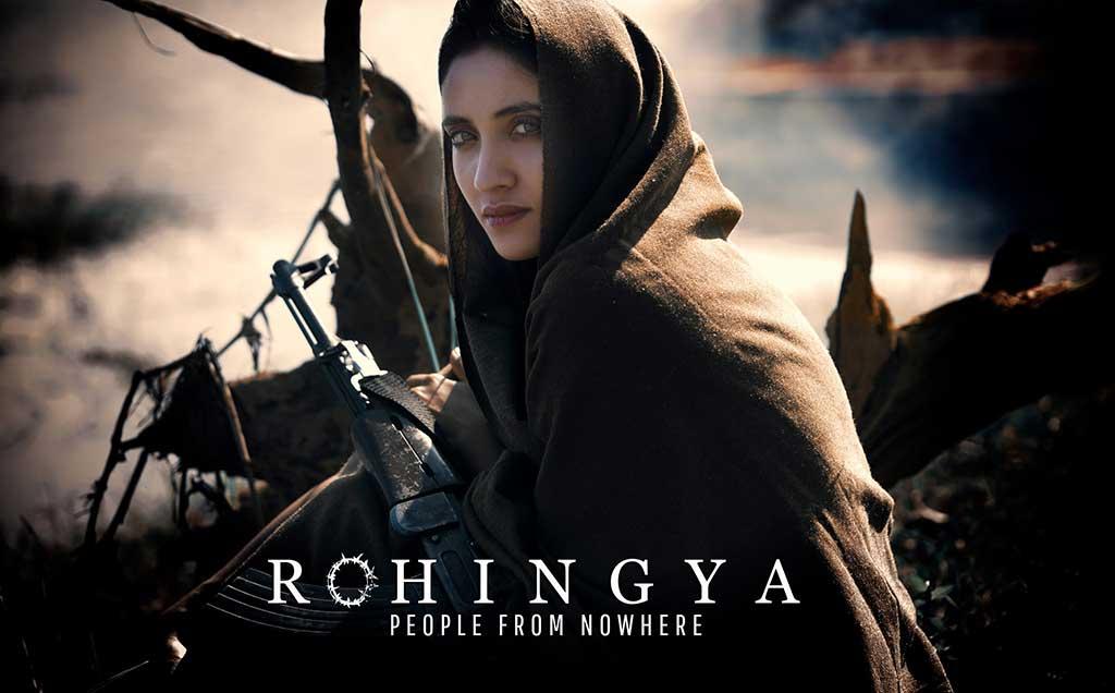 Bangladeshi actor Tangia Zaman Methila portrays a Rohingya woman in the film. In this still, her character is seen holding a gun.