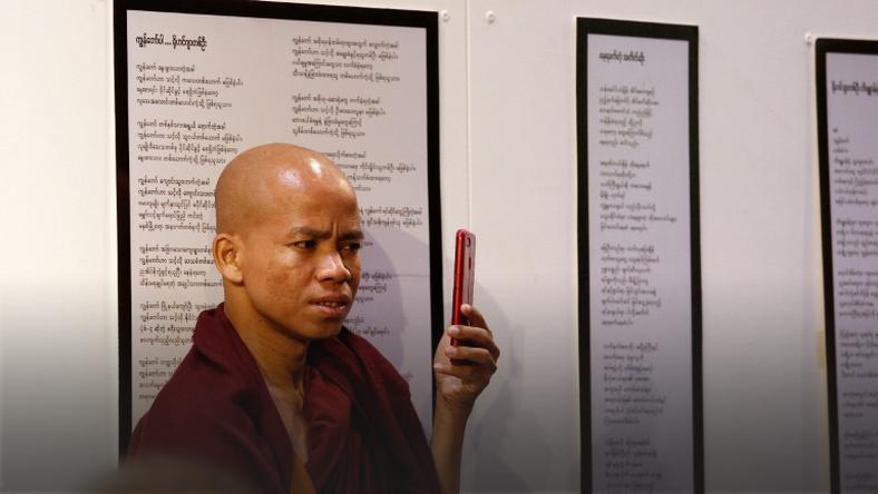  A Buddhist monk at the "Poetry for Humanity" event in which Rohingya Muslim poets recited poetry via a video link in Yangon. (Sai Aung Main / AFP)