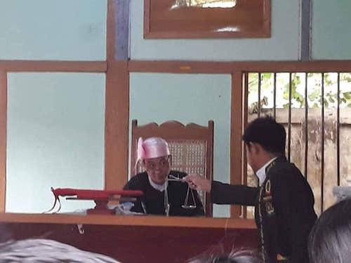 A photo shared on Facebook showing Pau Lu hand the broken scales to the judge.