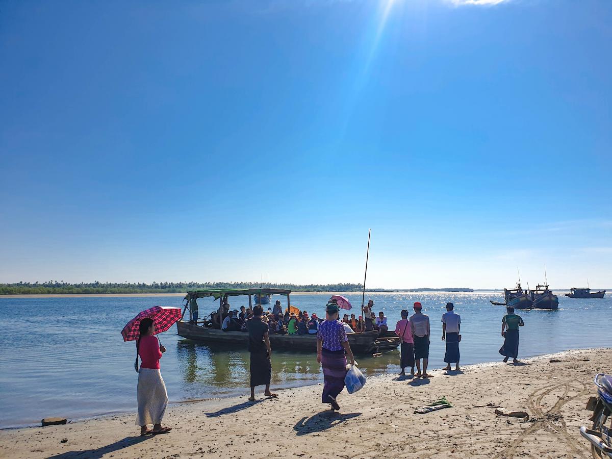 Boarding an estuary ferry on the way to Chaung Thar. (Dominic Horner)