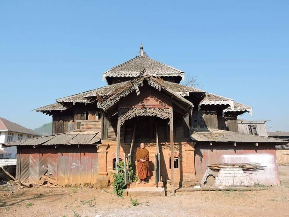 In this photograph posted in 2015, a Buddhist monk stands in front of Pinlaung Palace. (Eain Thu / Facebook)