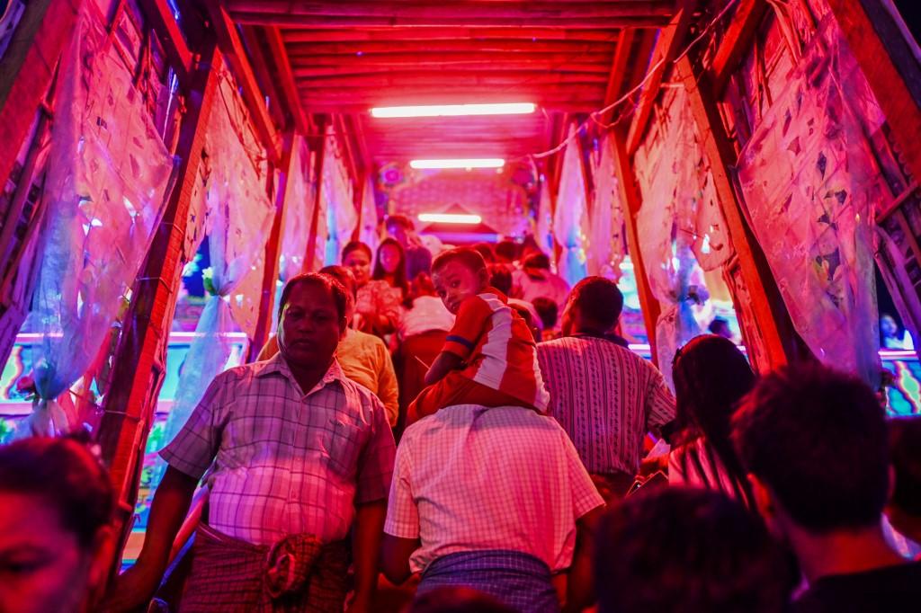 Devotees arrive at a makeshift palace to pay their respects during abbot Kay Lar Tha's funeral. (Ye Aung Thu / AFP)