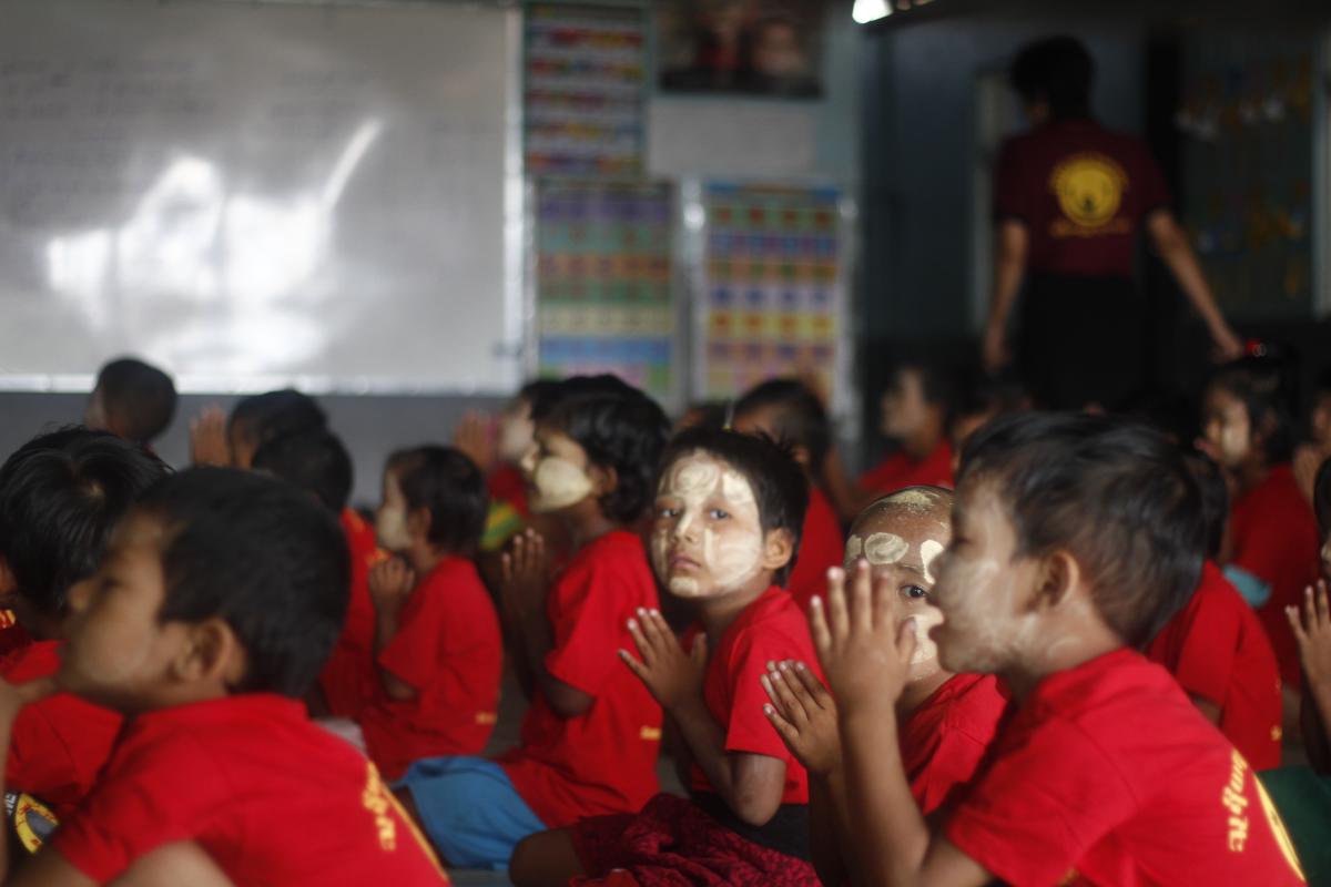 Slum-dwelling children receive food and education at SONNE Social Organisation's Yangon centre. (Lorcan Lovett / Southeast Asia Globe)