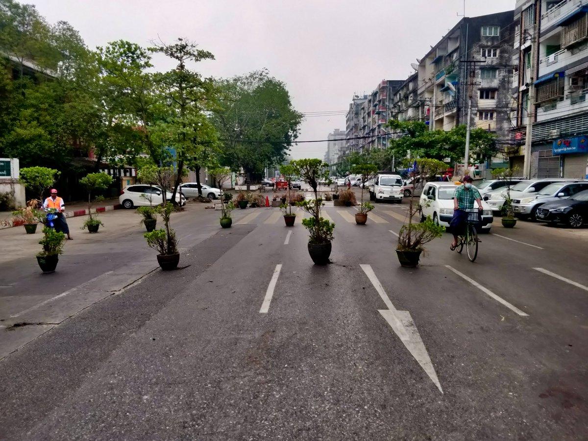 A barricade of plant pots assembled in downtown Yangon on March 1, kicked down by police on the evening of March 2 and reassembled later that evening.