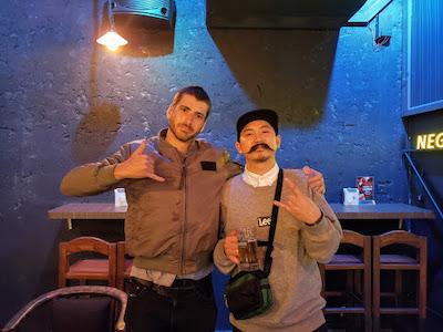 The writer (left) and Maung Chaw, owner of Moustache Bar. 