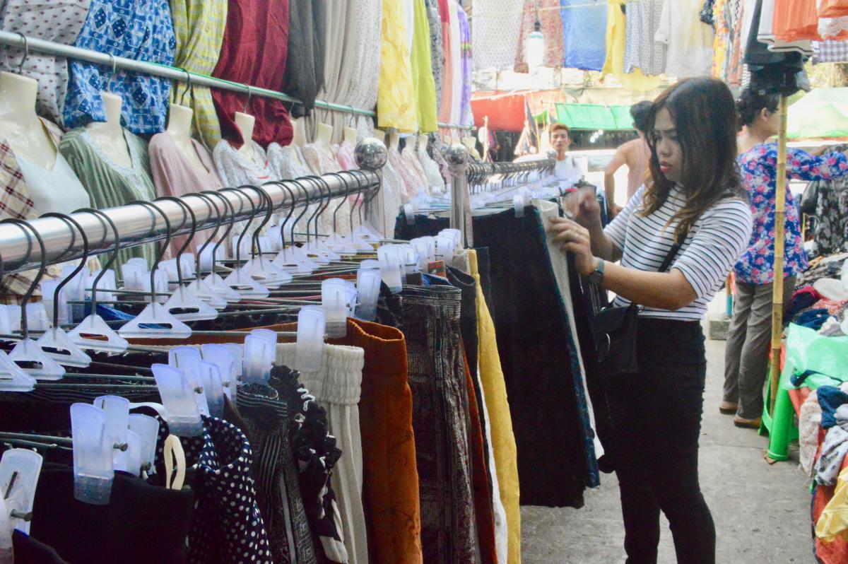 Sellers lament the rise of new and cheap China-made clothes. (Rita Shan)
