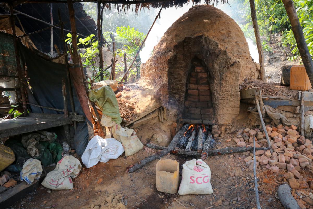 A kiln near Kyunsu to make mangrove wood into charcoal. (Victoria Milko / Mongabay)